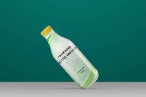 Mock-up-of-packaged-tilted-bottle-on-abstract-green-background