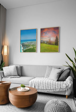 Two Hanging Poster Mock up on wall