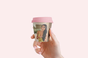 small-coffee-cup-in-woman-hand-mock-up