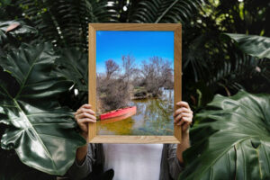 woman-hand-holding-frame-mock-up