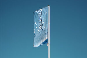 Flag Mockup on pole in blue sky