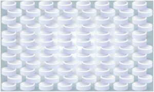 Several white tablet stack on white background