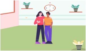 Two young girls standing in room in separate pose